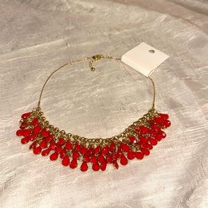 Coral toned bib style necklace - new